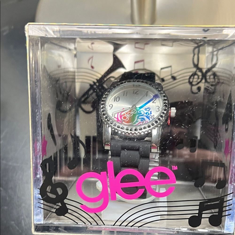 Glee Watch with Black Strap and Rainbow Accent Dial. New in box. 2 available